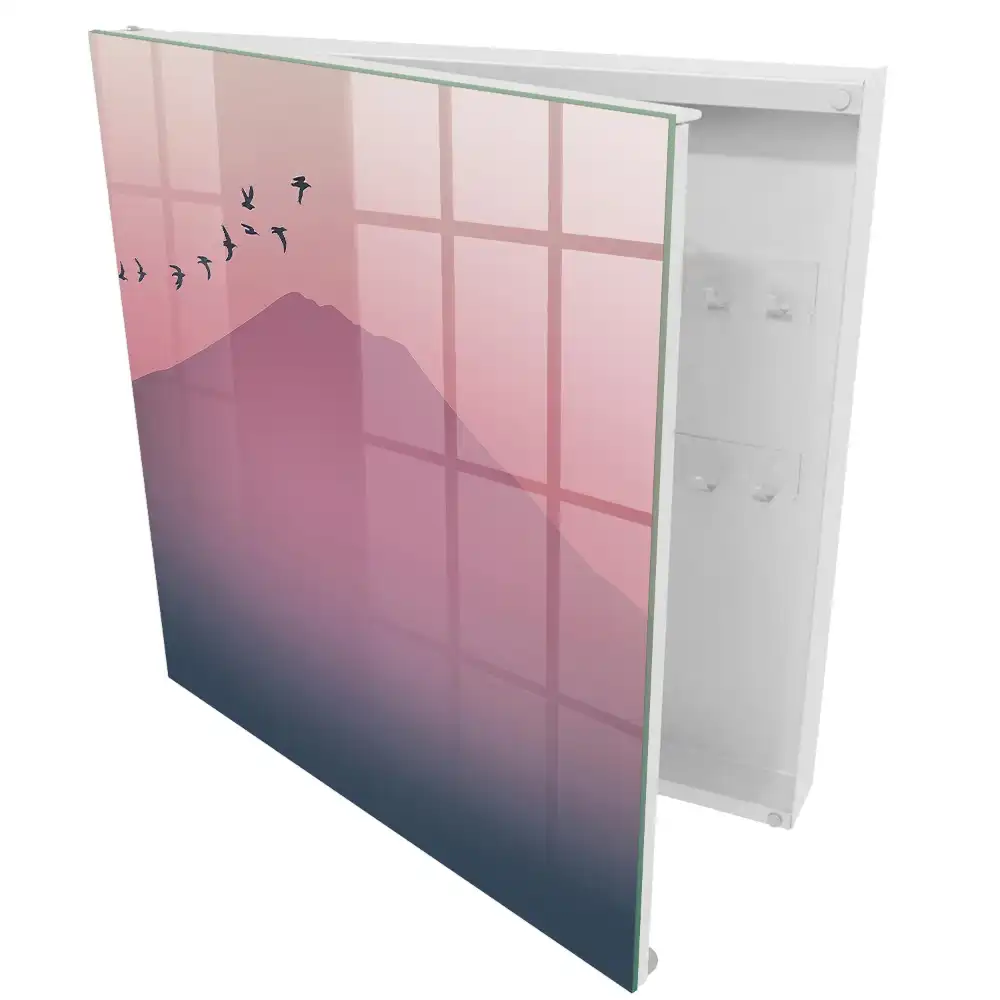 Armoire à clés une douce montagne et des oiseaux dans un ciel rose