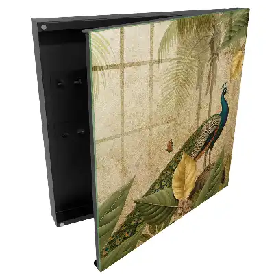 Armoire à clés paon sur fond de plantes et de feuilles exotiques