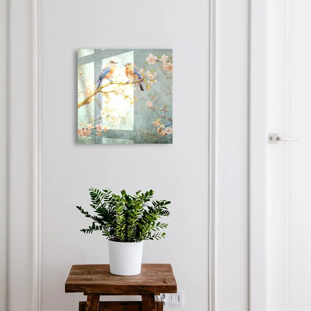 Armoire à clés oiseaux pastel sur une branche parmi les fleurs