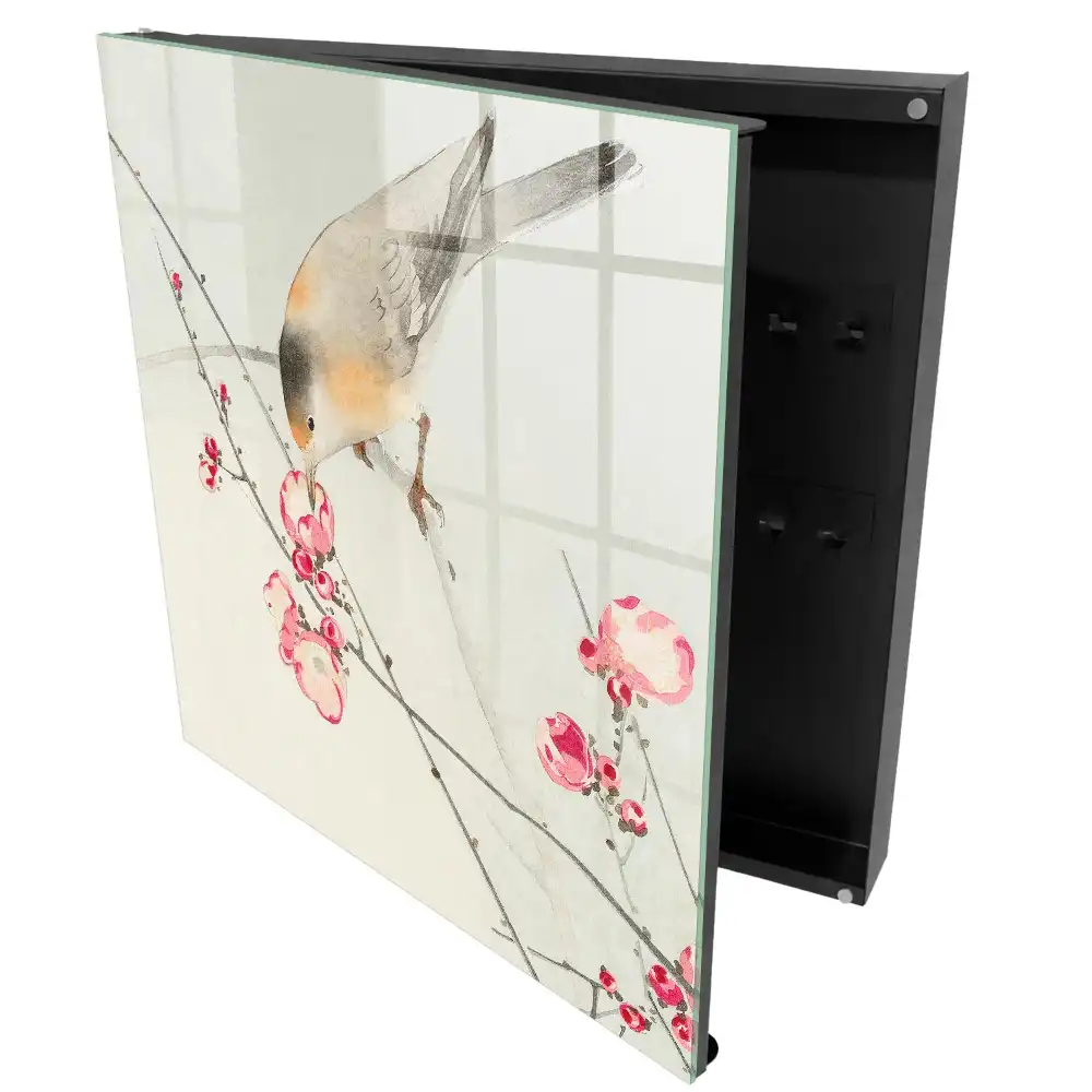 Boîte à clés un oiseau sur une branche des fleurs délicates un style subtil