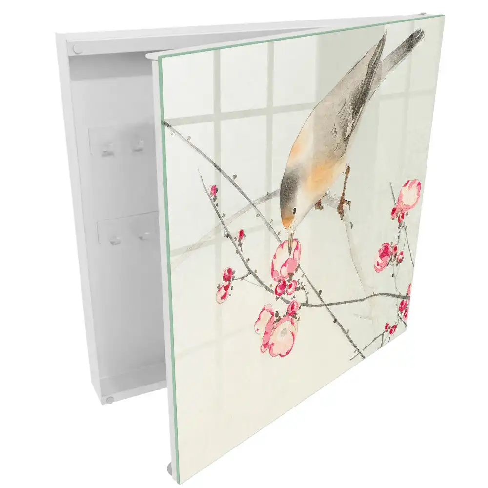 Boîte à clés un oiseau sur une branche des fleurs délicates un style subtil