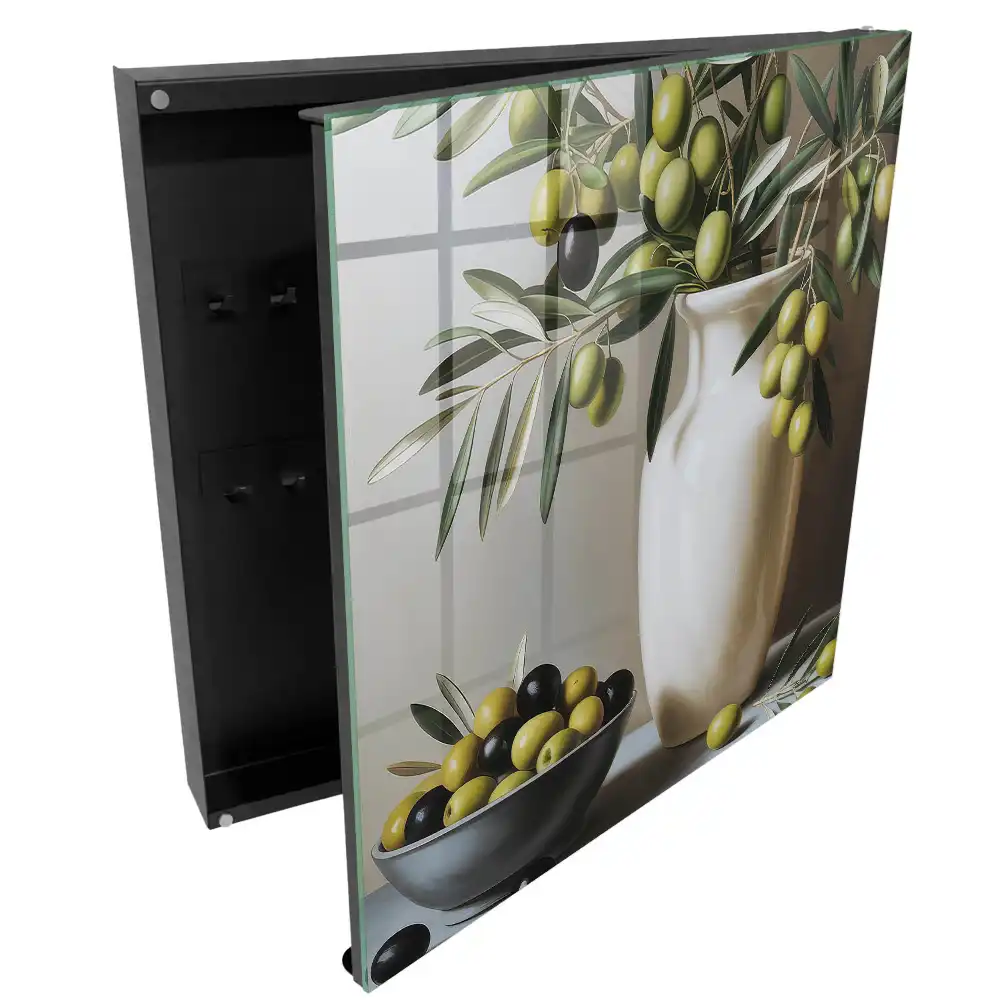 Armoire à clés une olive dans un vase et un bol contrastant avec le blanc