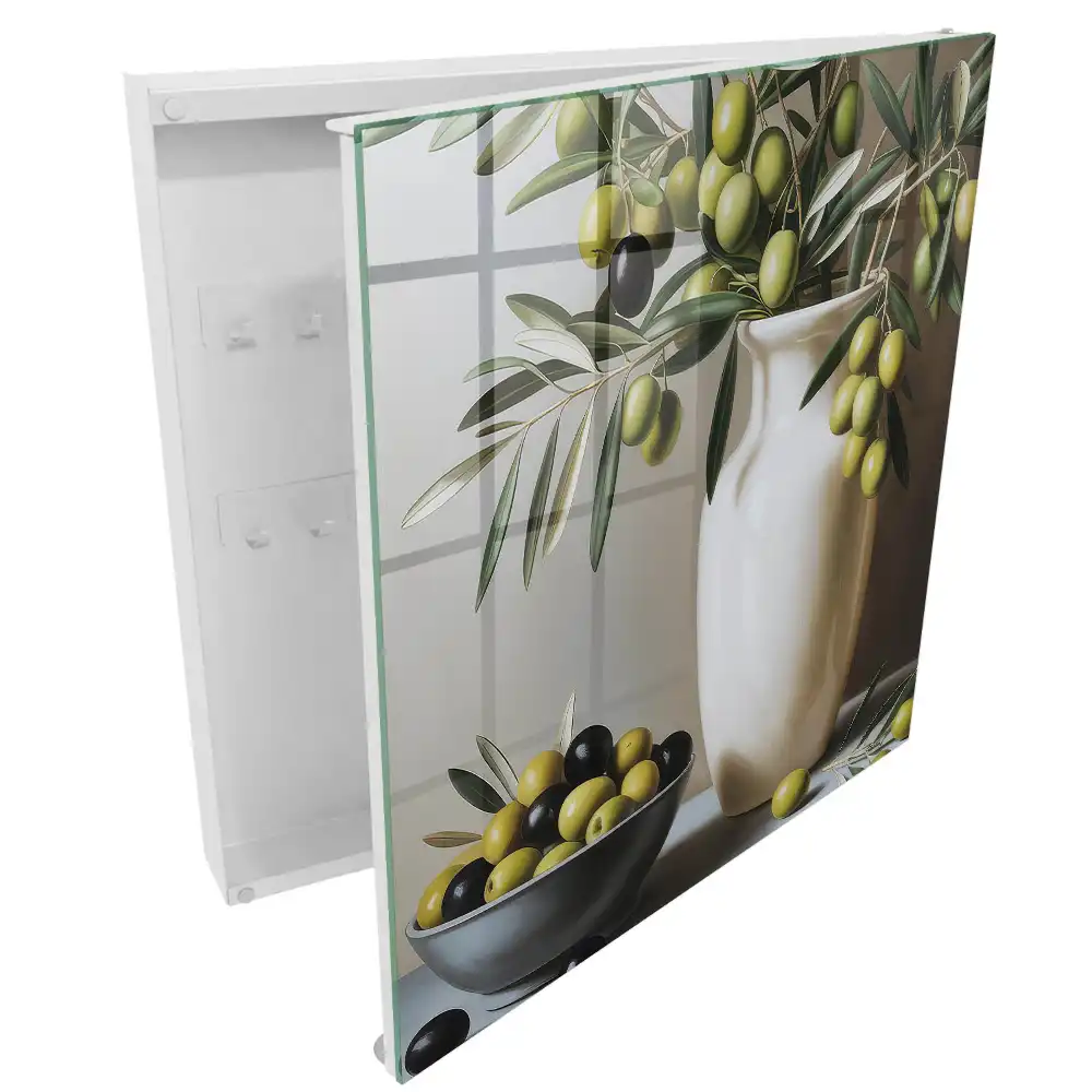 Armoire à clés une olive dans un vase et un bol contrastant avec le blanc