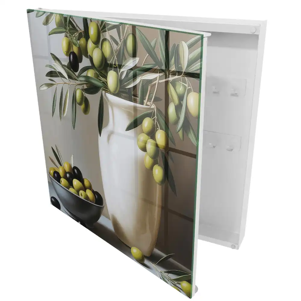 Armoire à clés une olive dans un vase et un bol contrastant avec le blanc