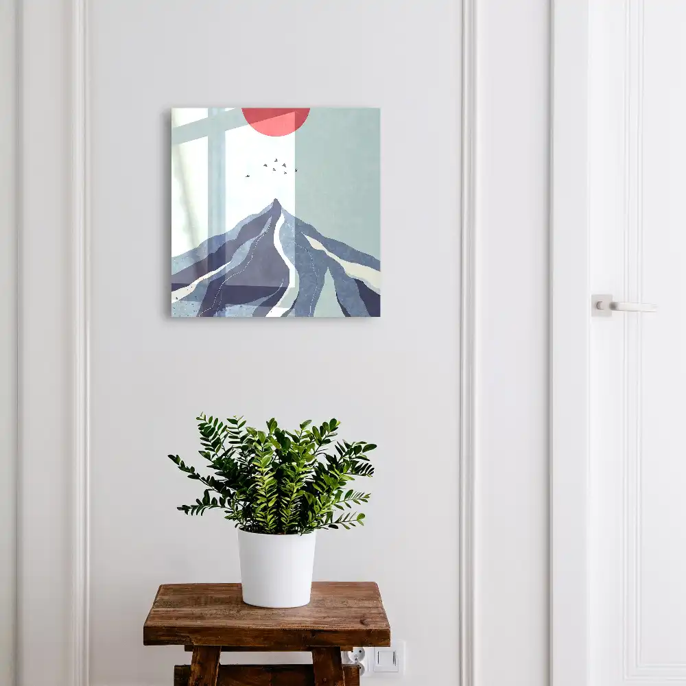 Boîte à clés murale des montagnes bleues avec un soleil rouge en arrière-plan