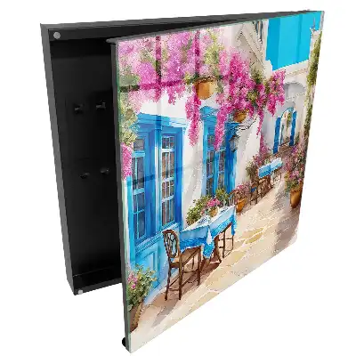 Boîte à clés un coin méditerranéen avec des fleurs et du ciel