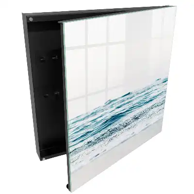 Boîte à clés murale la mer et les douces vagues sous un ciel bleu