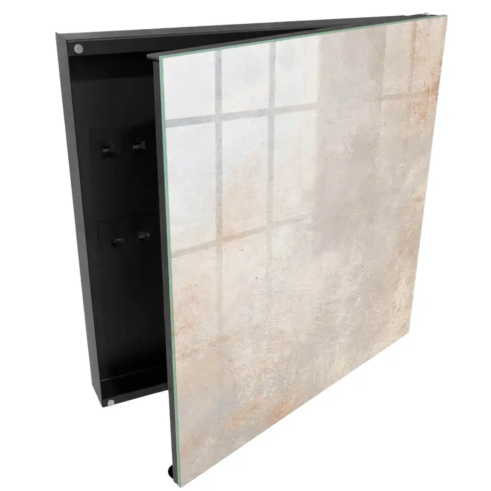 Armoire à clés des nuances subtiles de gris-beige avec de délicates abrasions