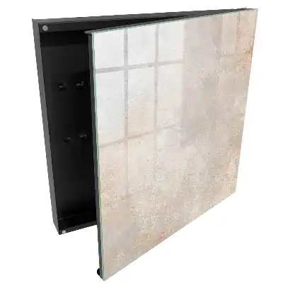 Armoire à clés des nuances subtiles de gris-beige avec de délicates abrasions