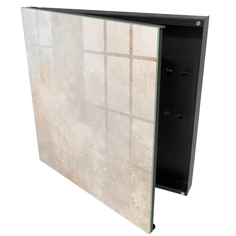 Armoire à clés des nuances subtiles de gris-beige avec de délicates abrasions