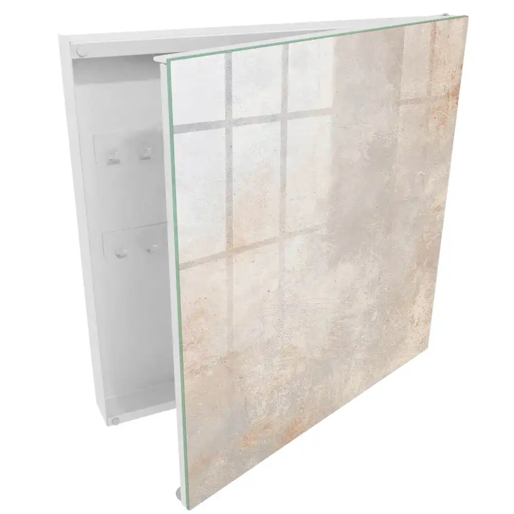 Armoire à clés des nuances subtiles de gris-beige avec de délicates abrasions