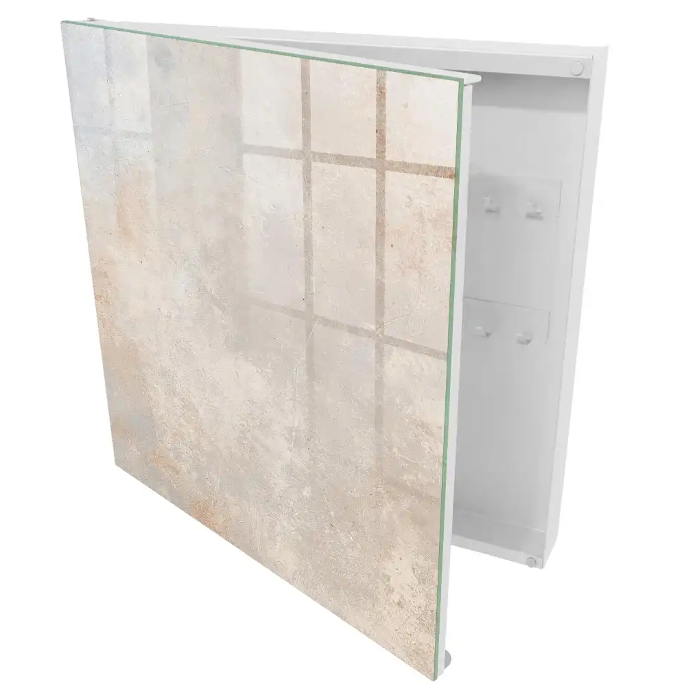 Armoire à clés des nuances subtiles de gris-beige avec de délicates abrasions