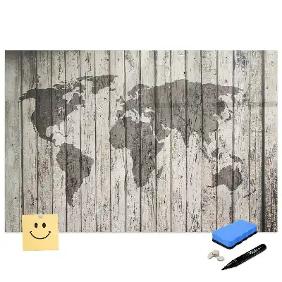 Tableau blanc magnétique effaçable à sec représentant une carte du monde sur fond de table en bois