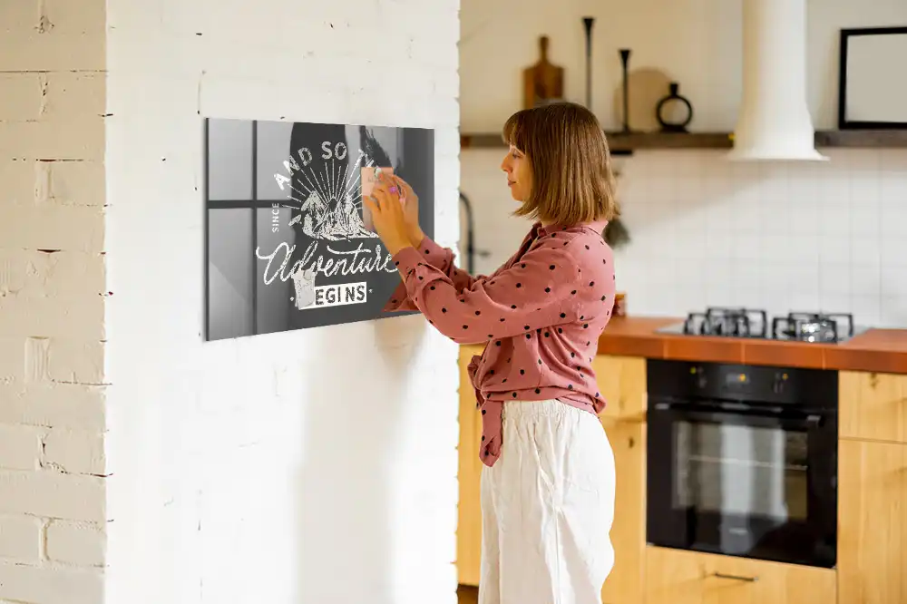 Tableau magnétique en verre avec citation sur l'aventure